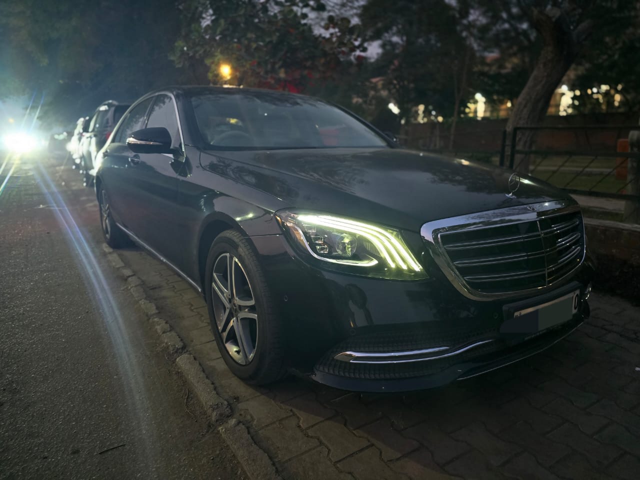 Front three-quarter view at night with LED headlights