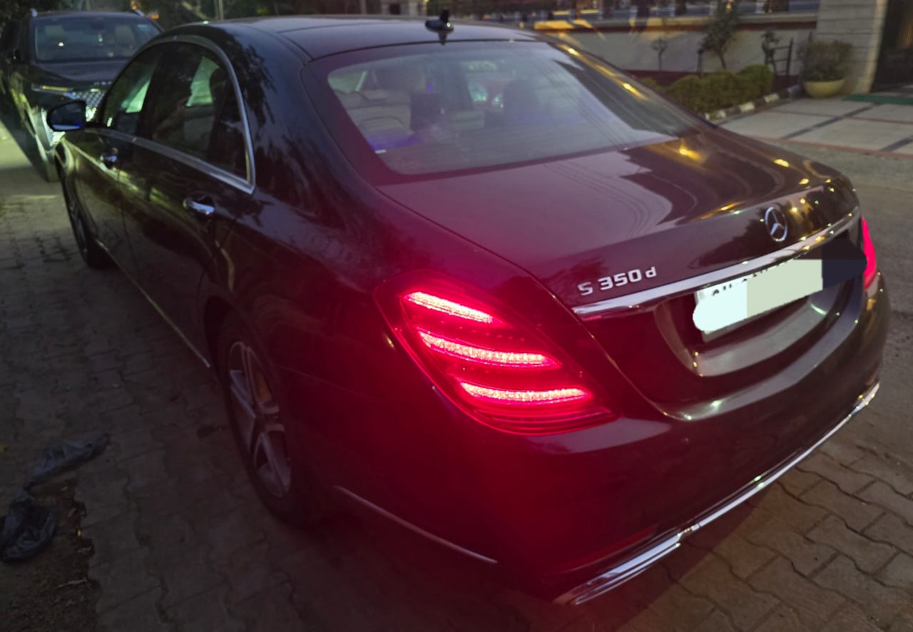 Rear view showing S 350 d badge and taillights